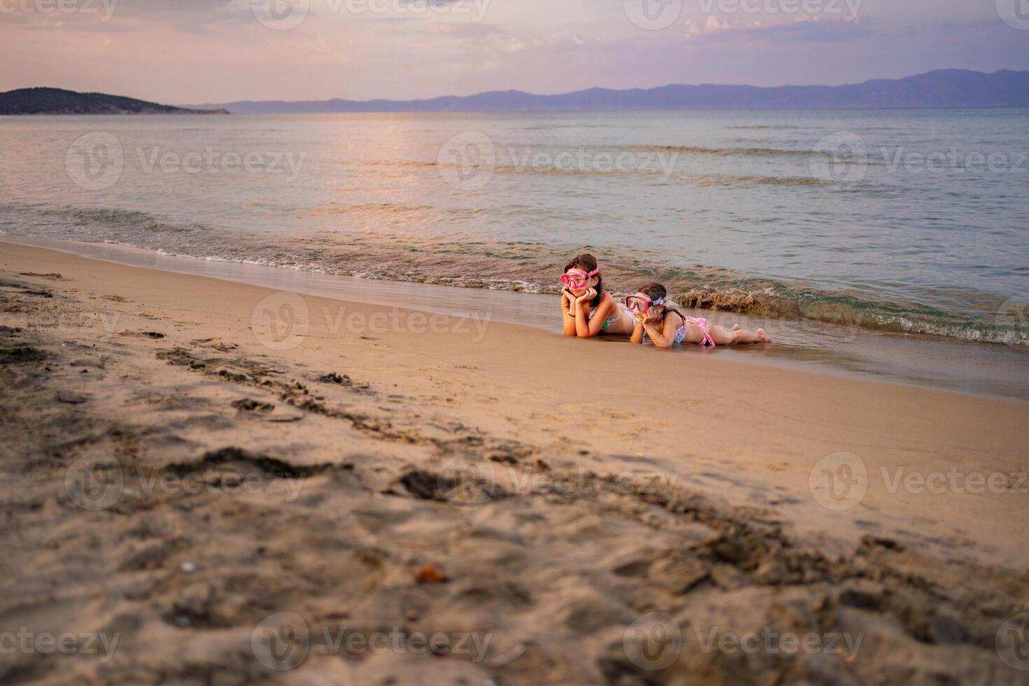 Fun moments at the beach with family enjoying the sunset together photo