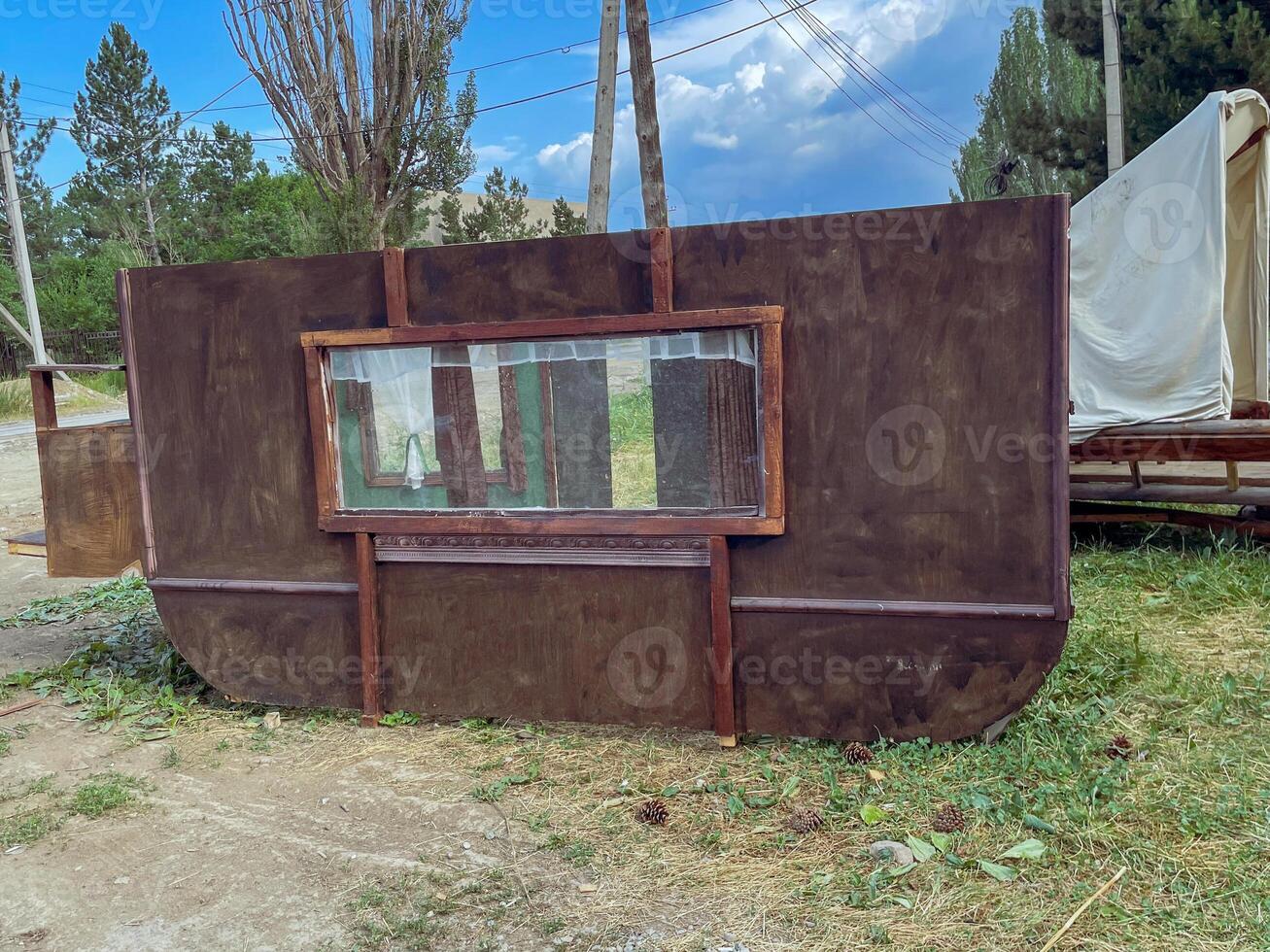 Rustic Wooden Structure with Window photo