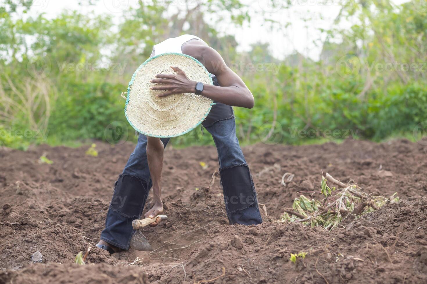 local farmer working on his farm photo