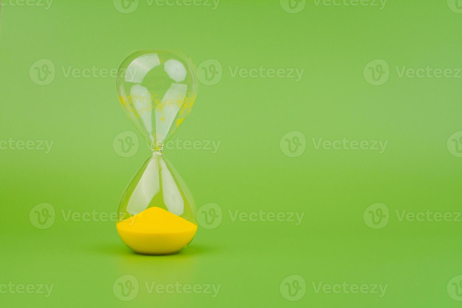 Hourglass High quality photography concept of time and effective time management. photo