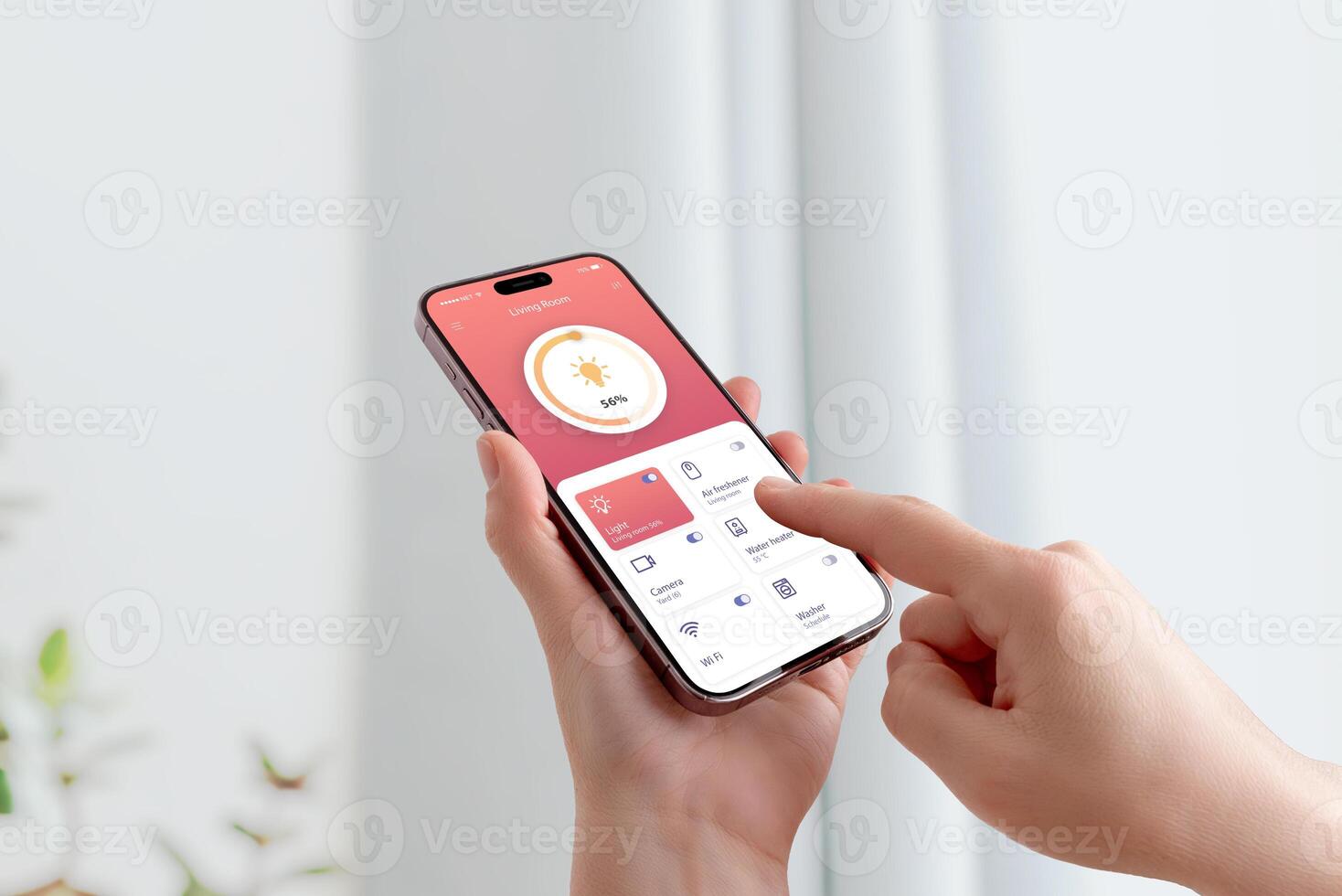User adjusting room lighting through smartphone interface with modern smart home technology photo