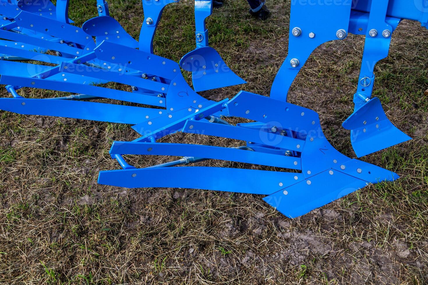Working bodies of the plow for the cultivation of the land. Agricultural machinery photo