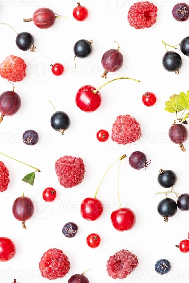 Mixed fresh garden berry background. Red, black and maroon berries. Natural food ingredients. photo