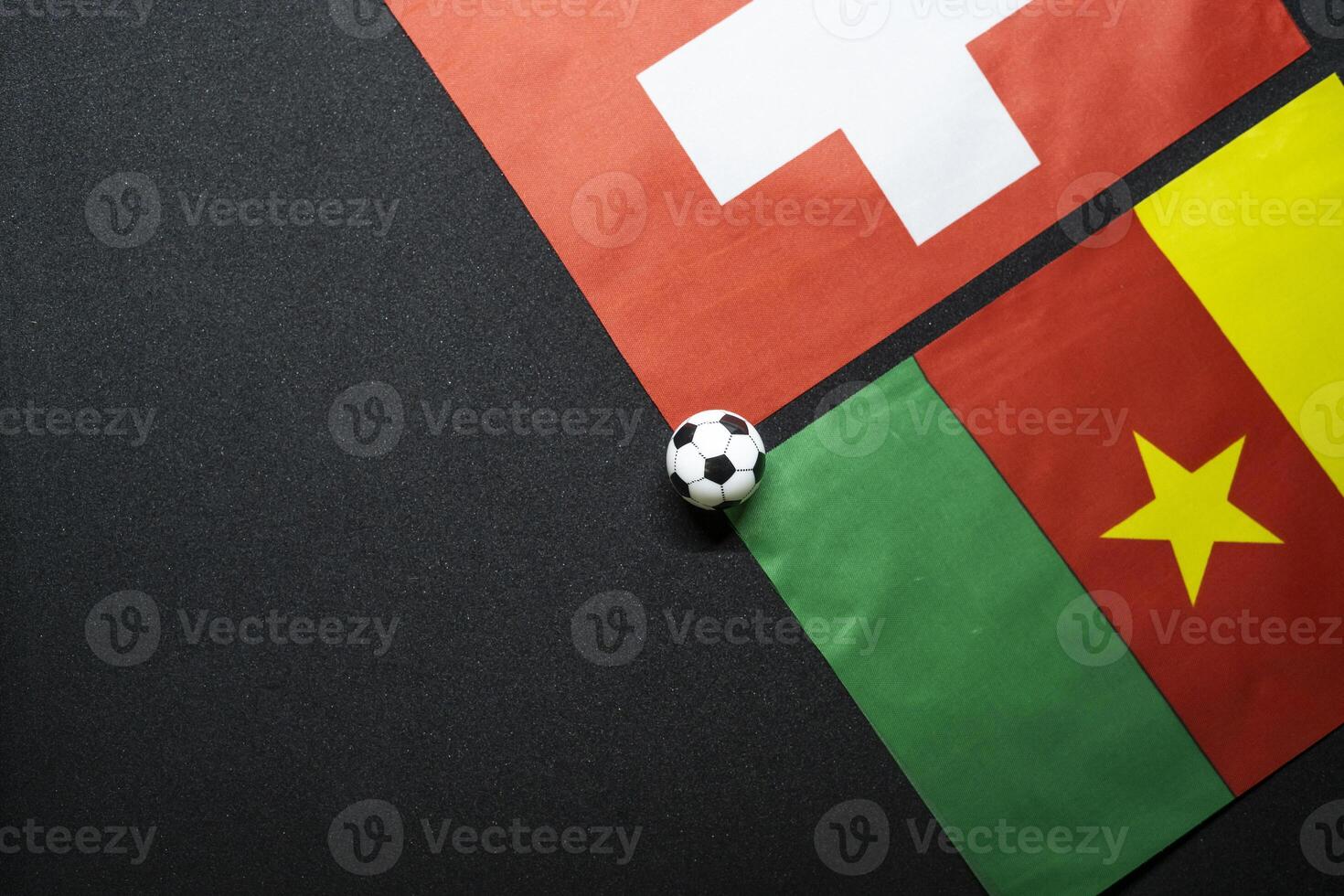 Switzerland vs Cameroon, Football match with national flags photo