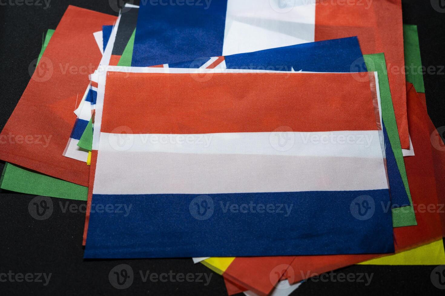 Netherlands Flag with Background of Other National Flags photo