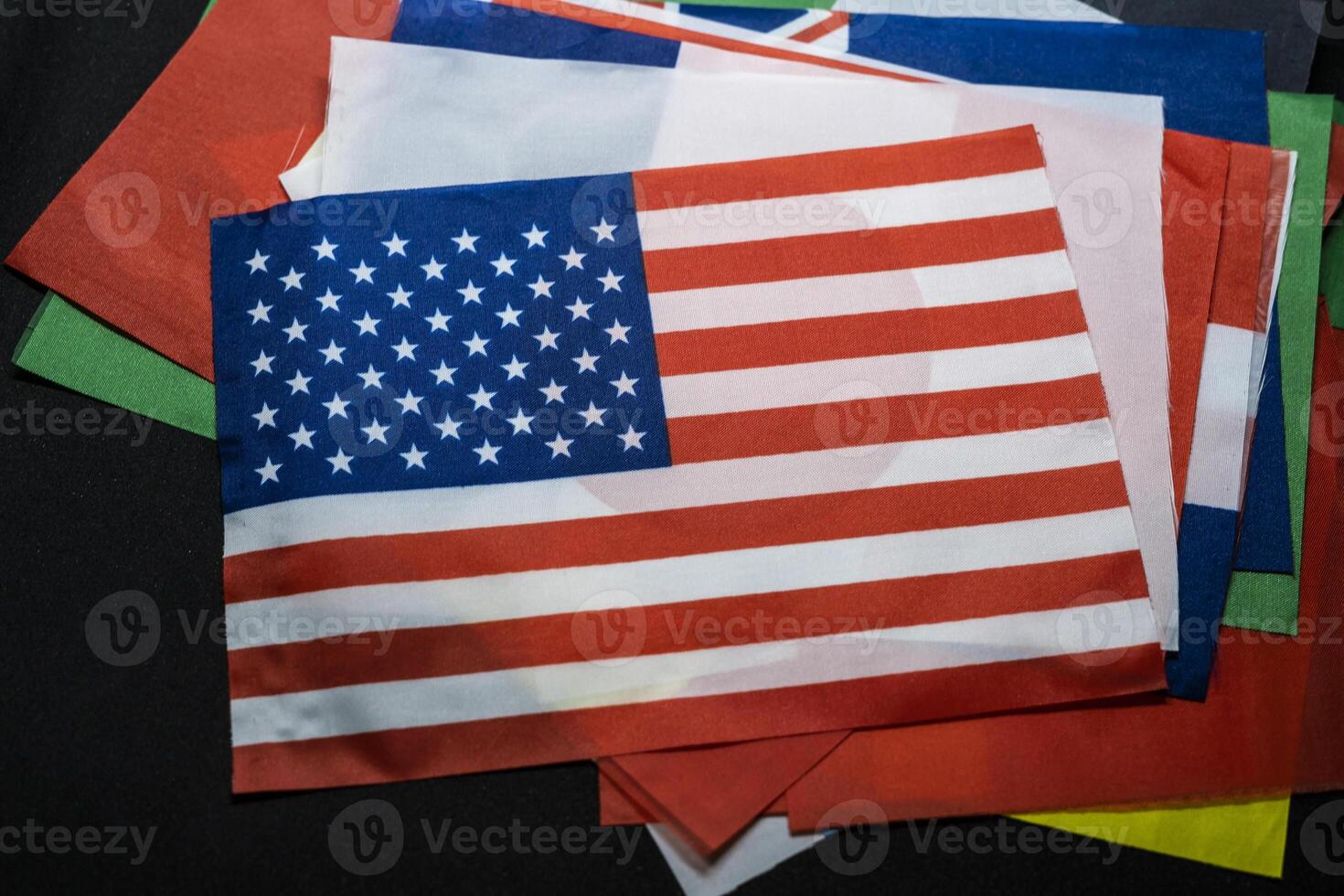 USA Flag with Background of Other National Flags photo