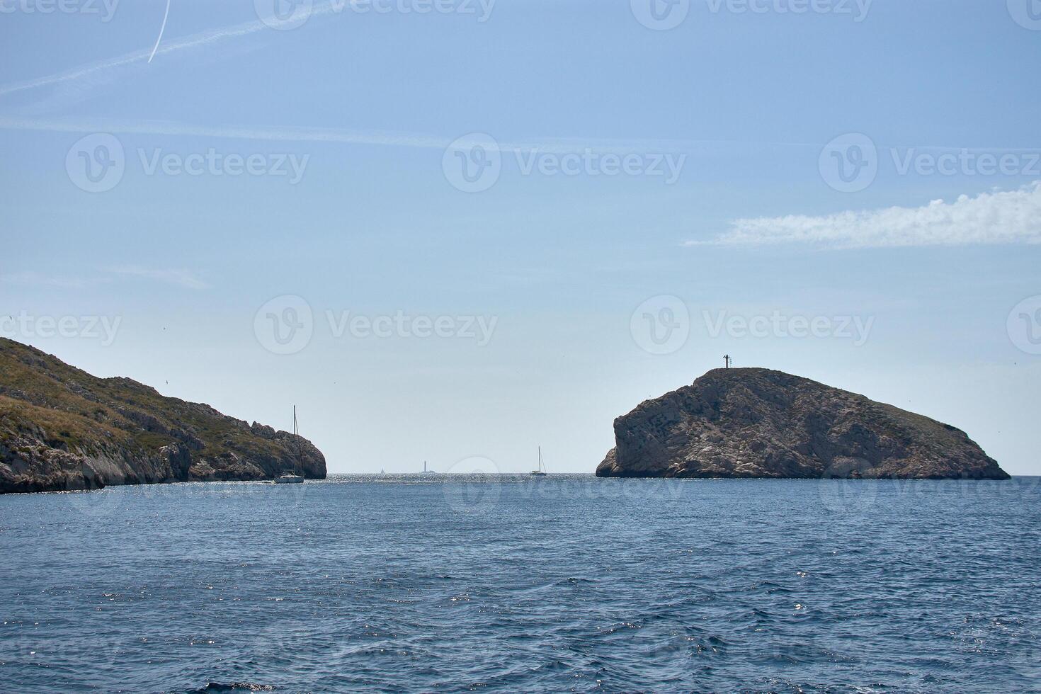 Maritime scene of the Calanques of Marseille observed from a boat, ideal for tourism and nature in France photo