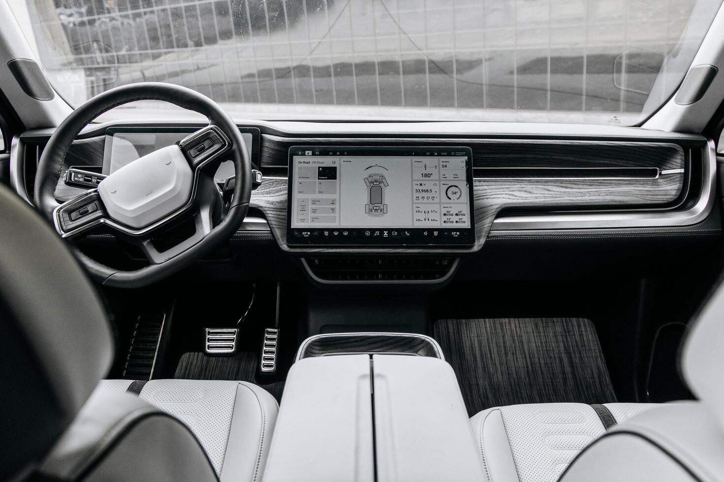 Zaporizhia, Ukraine, 2025 -Close-up of a car steering wheel in a modern new car. The interior of a stylish new car. Concept of stylish design, shopping photo