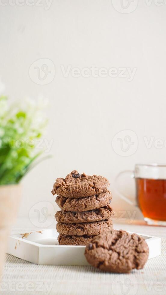 Chocolate cookies and a cup of tea photo