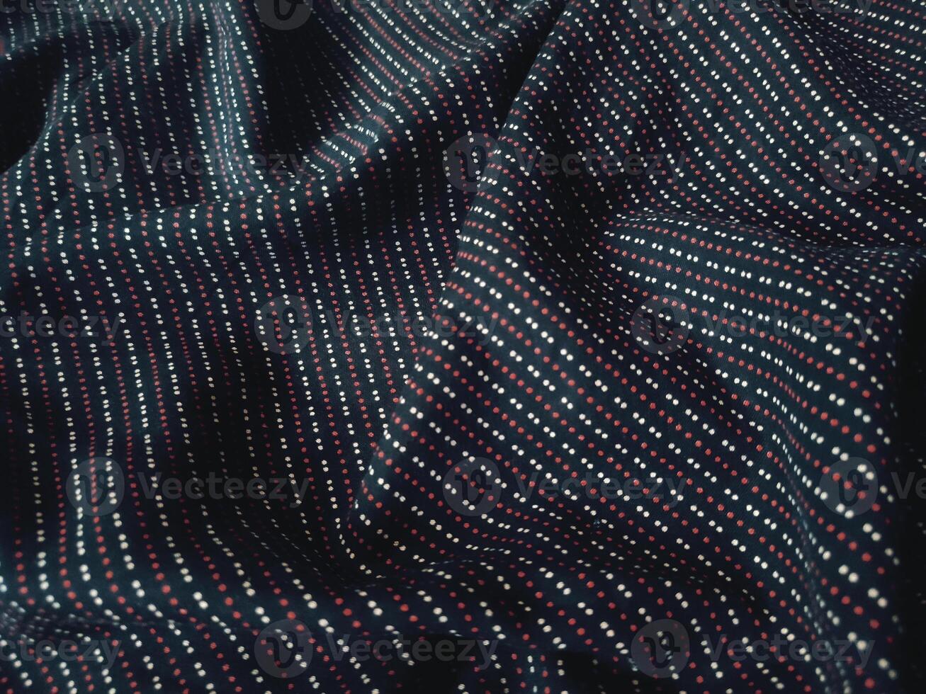 close up of black and red striped fabric photo