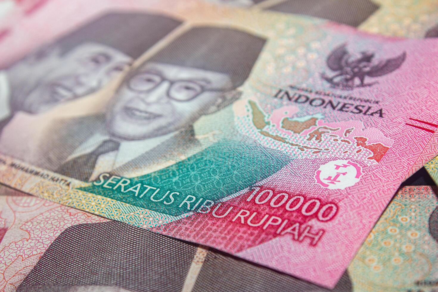 a pile of indonesian currency photo