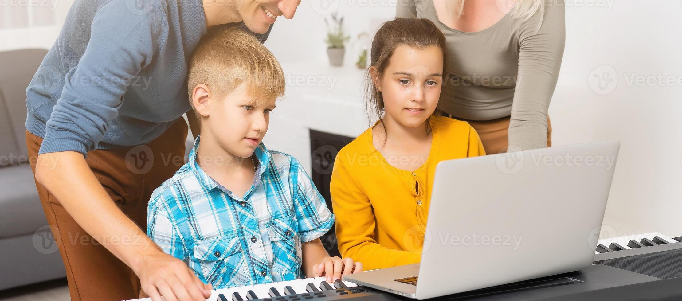 Cute kids friends using laptop photo