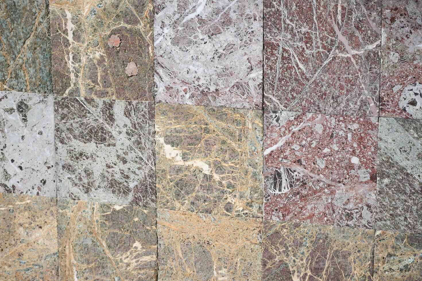 Beautiful tile arrangement of various marble patterns photo