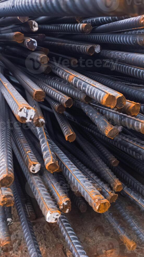 Close-Up of Rusty Steel Rebars at Construction Site photo