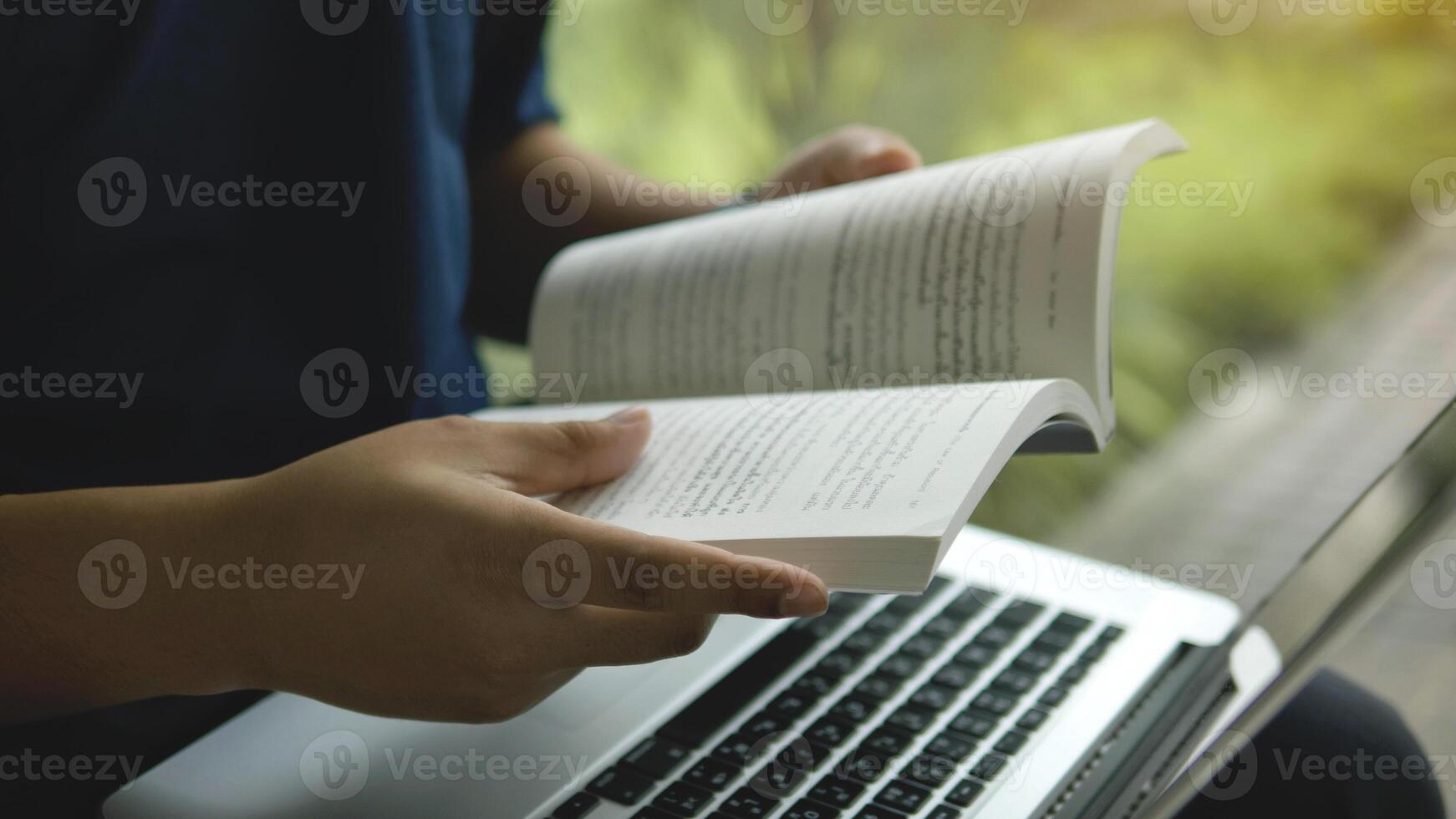 Reading books to enhance knowledge and seek knowledge from the world of books. Learning from silence and relaxation photo