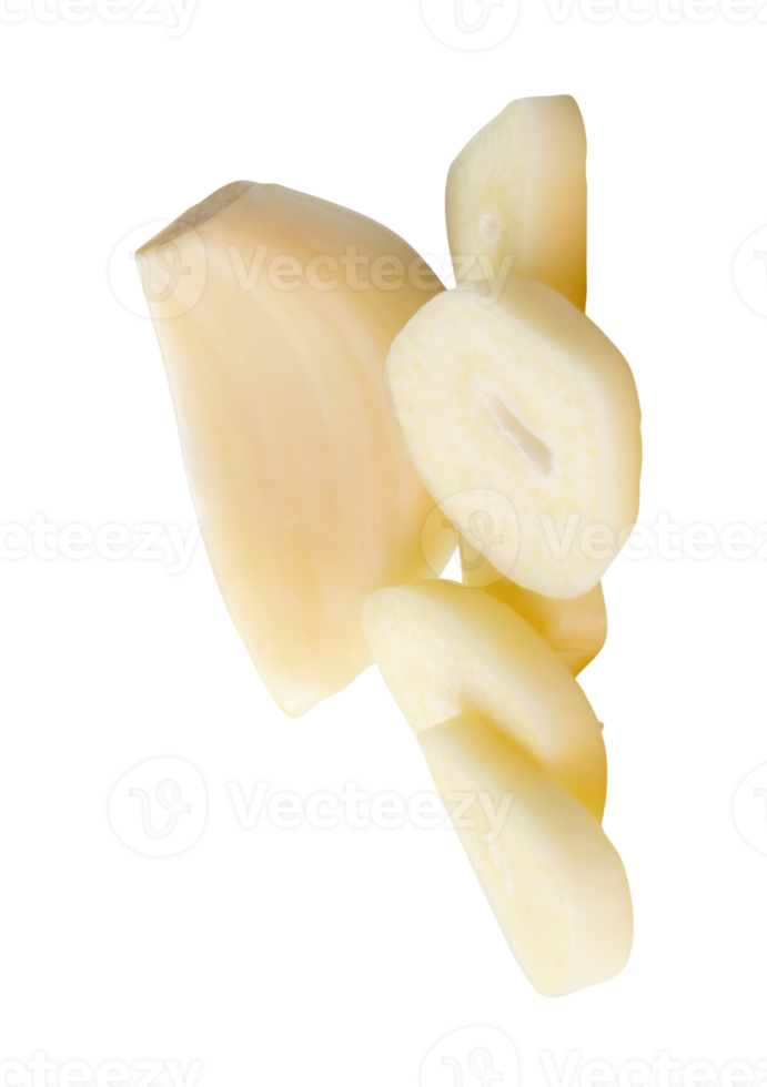 Side view of peeled garlic clove with slices in stack isolated with clipping path in file format png