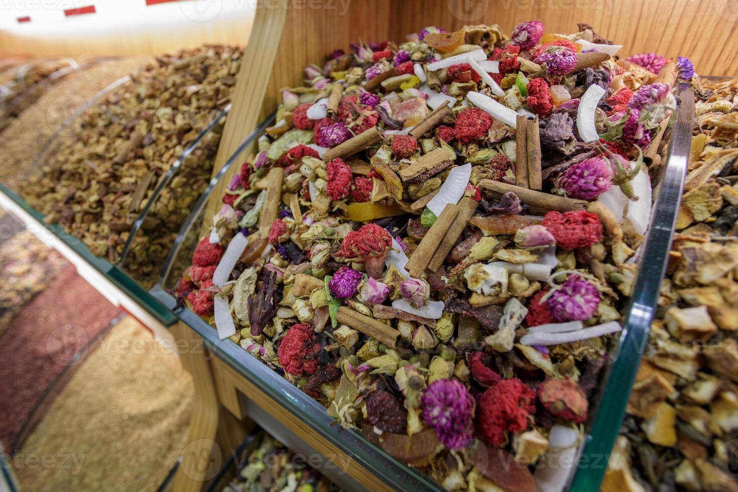 Colorful Turkish Herbal Tea Blend with Dried Flowers, Fruits, and Cinnamon in Traditional Spice Market photo