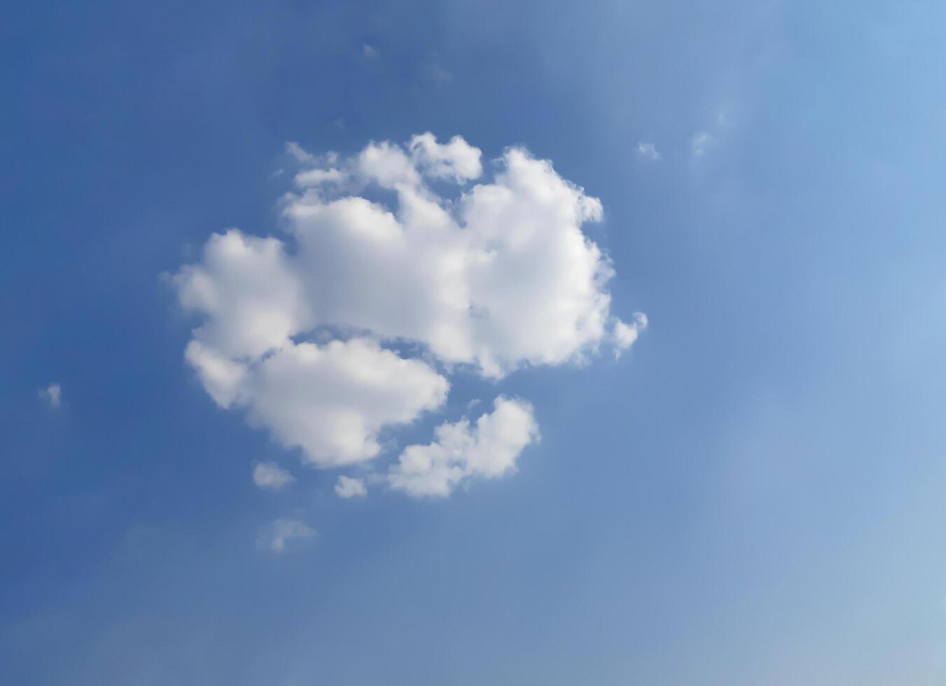 White cloud of circle shape on blue sky. Background image. photo