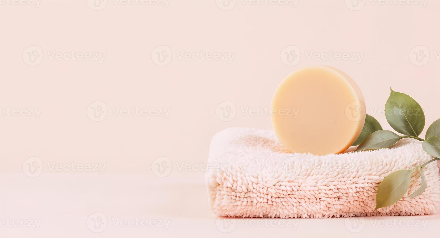 A towel with a soap bar on top of it photo