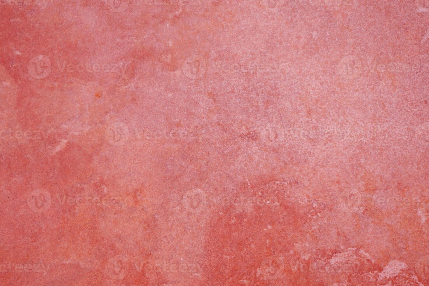 Coral-colored abstract background with various patterns photo