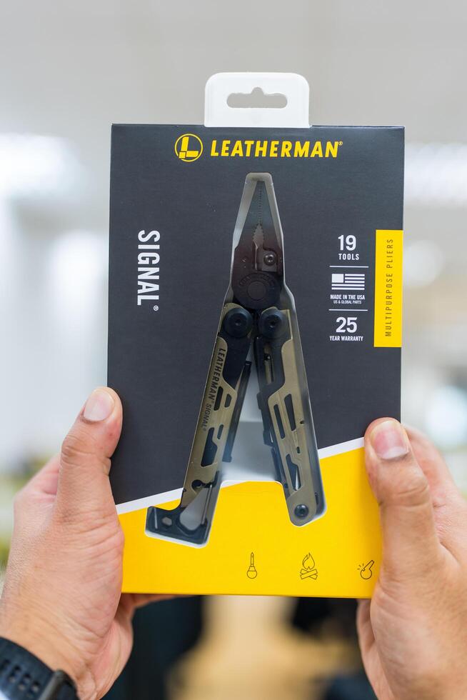 Bangkok, Thailand - July 12, 2025 A box of Leatherman Signal Multi Tools. A perfect fit for any adventure. photo
