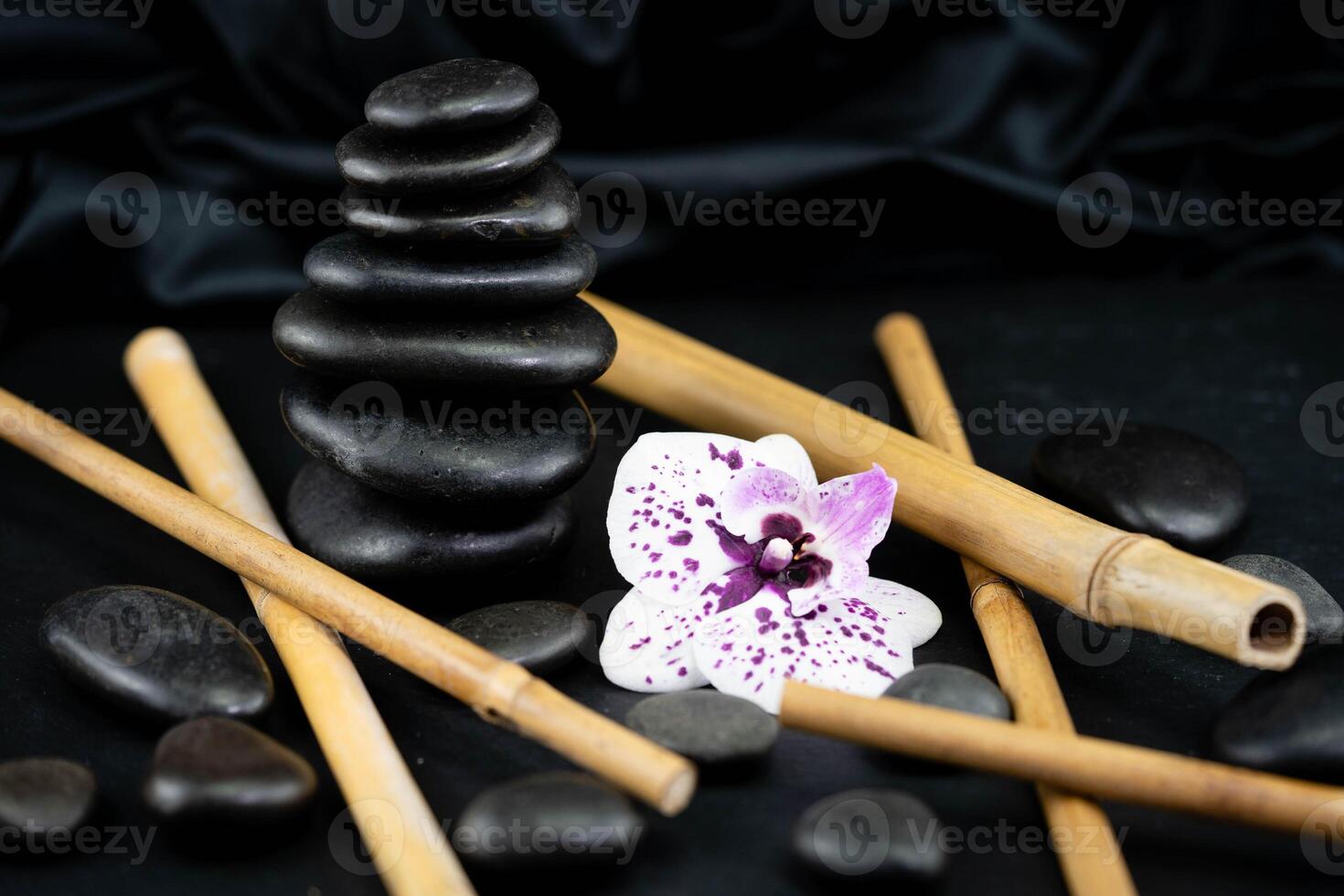 A tower of small black stones photo