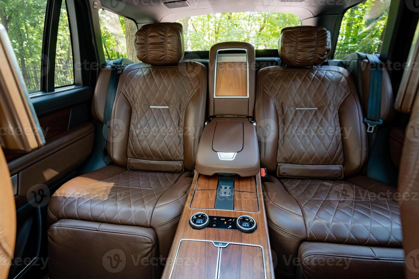 The Luxurious Leather Interior of a HighEnd SUV offers an unparalleled level of comfort, making every journey an extraordinary and enjoyable experience that you wont soon forget photo