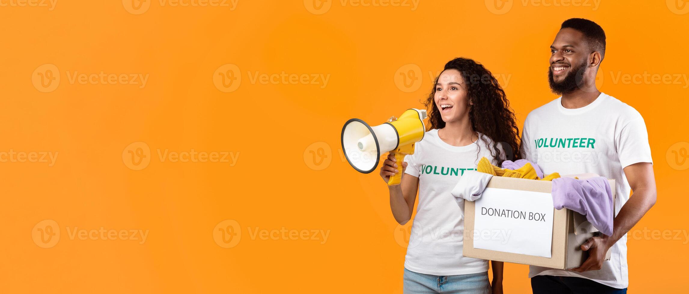 Volunteers with donation box photo