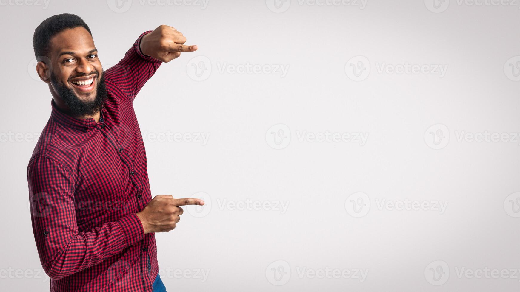 Man pointing with a smile photo