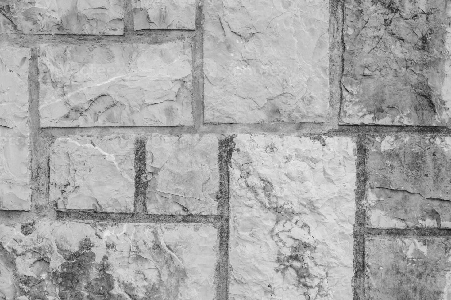 Grey Stone wall. Texture or Background in monochrome. Black and White background. photo