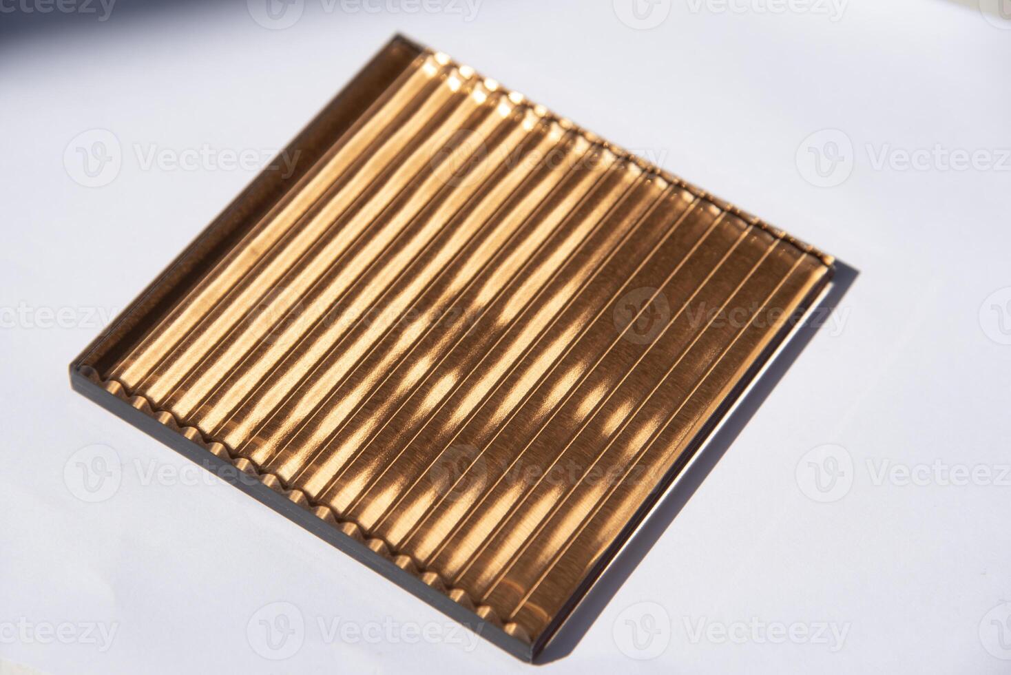 Patterned glass on white background.text space. photo