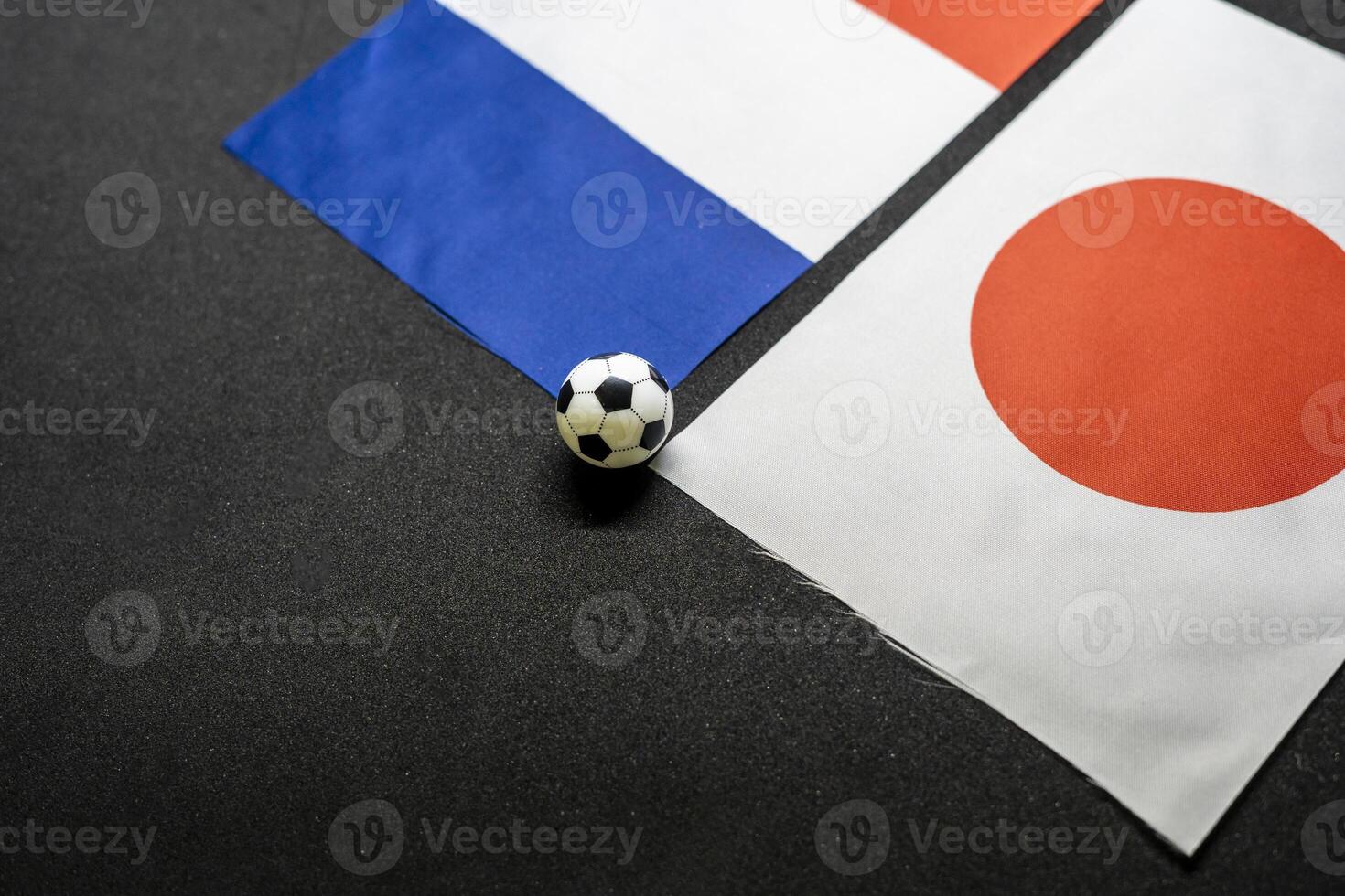 Flags of France and Japan in International Football Scene photo