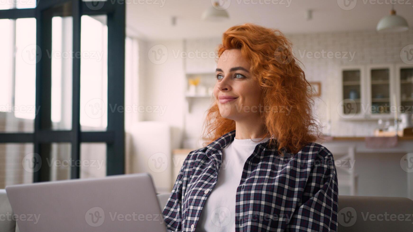 Pensive thinking looking away Caucasian woman female lady freelancer girl student e-learning working business online internet computer typing laptop internet shopping buying purchase at home couch photo