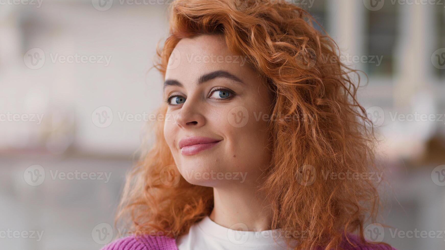 Happy smiling portrait positive carefree smile healthy ginger hair Caucasian woman female girl homeowner at home looking at camera face glad satisfied medicine loan mortgage insurance indoors lady photo