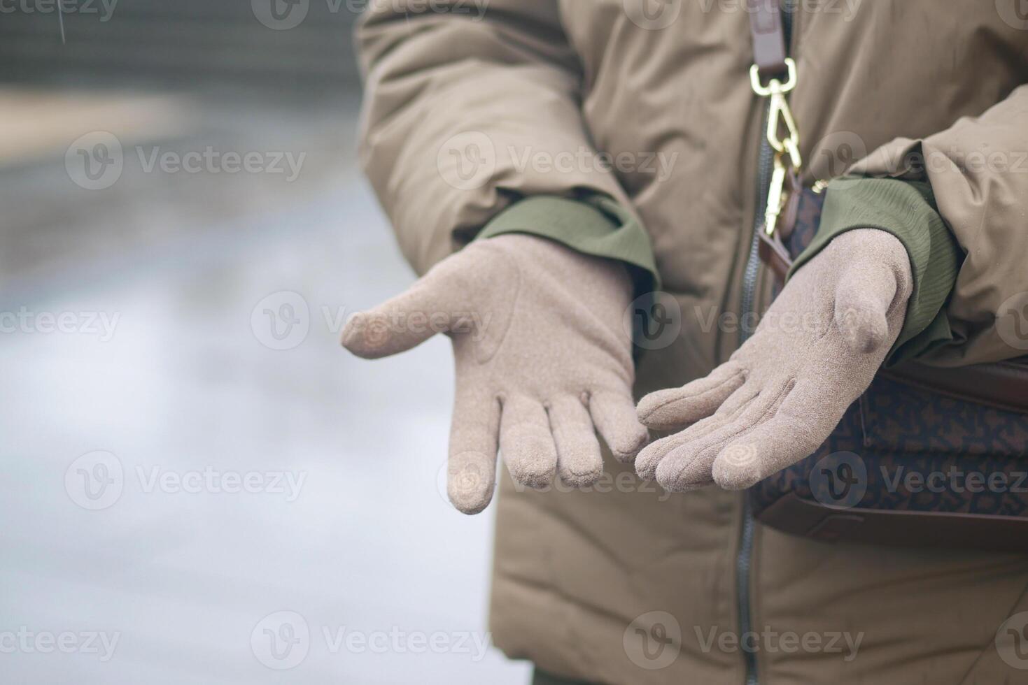 Hands extended in greeting on a rainy day photo