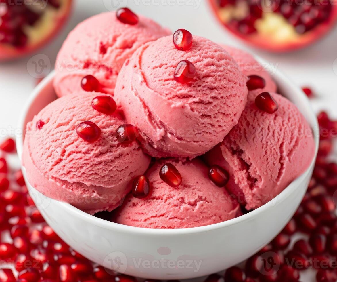 Bowl of pomegranate ice cream with seeds photo