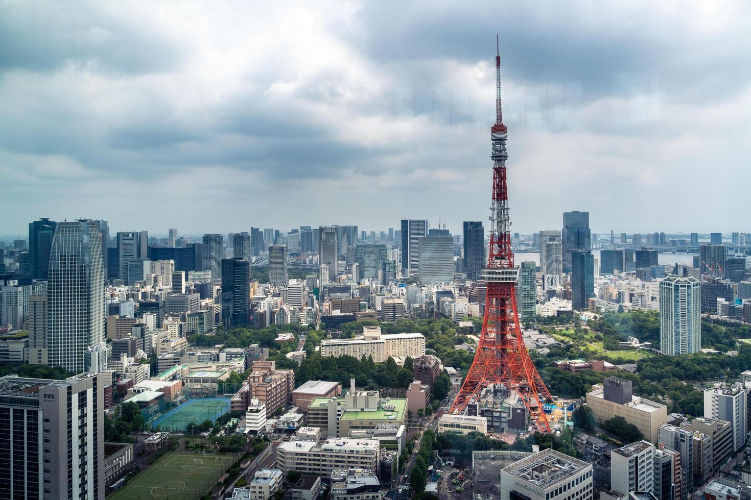 Tokyo, Japan-august 6, 2024-the famous Tokyo Tower seen from the Azabudai hills observatory during a cloudy day photo