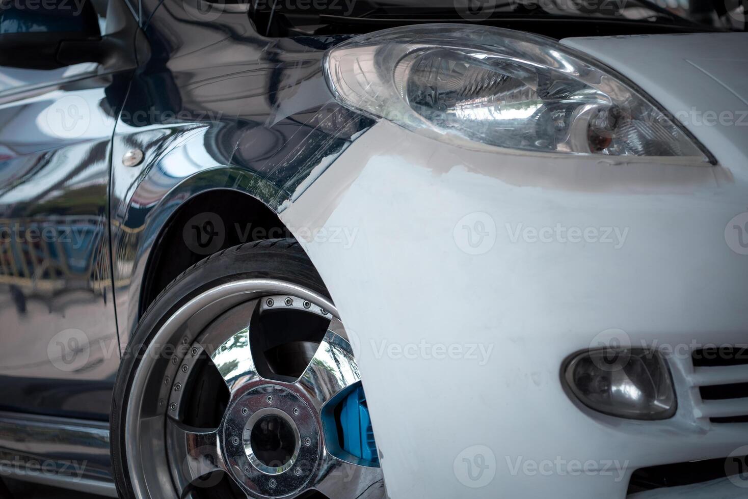 A close up of a car with a blue rim photo