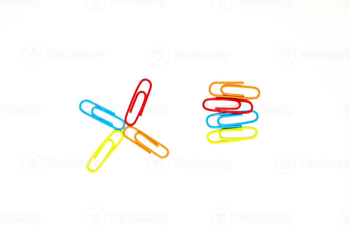Colorful Paper Clips in Arrangement on White Background photo