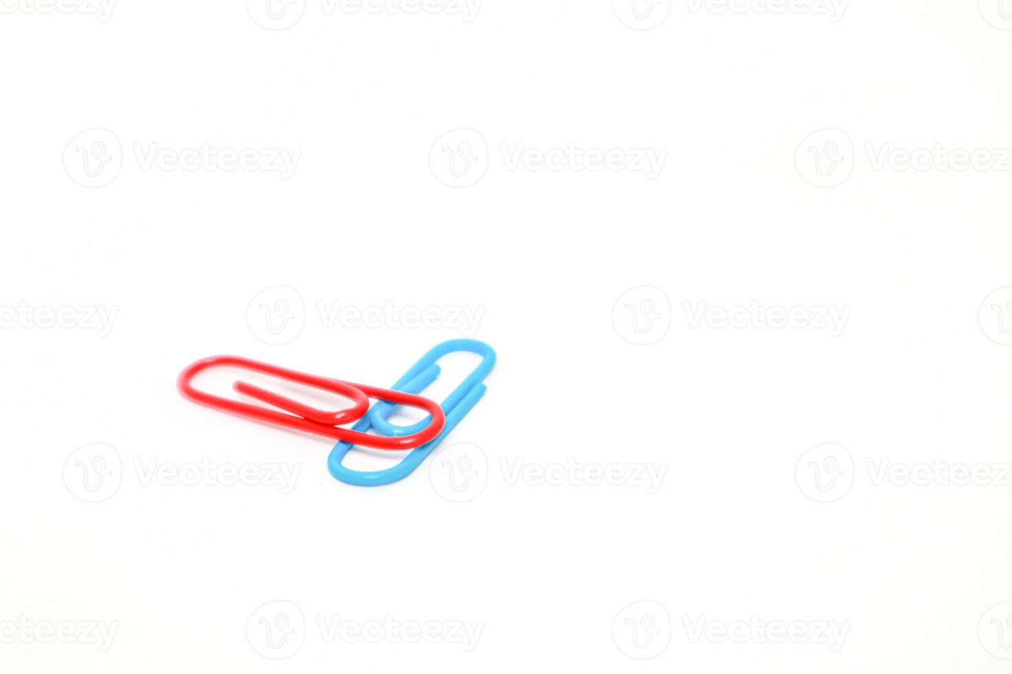 A Red and Blue Connection on a Clean White Backdrop photo