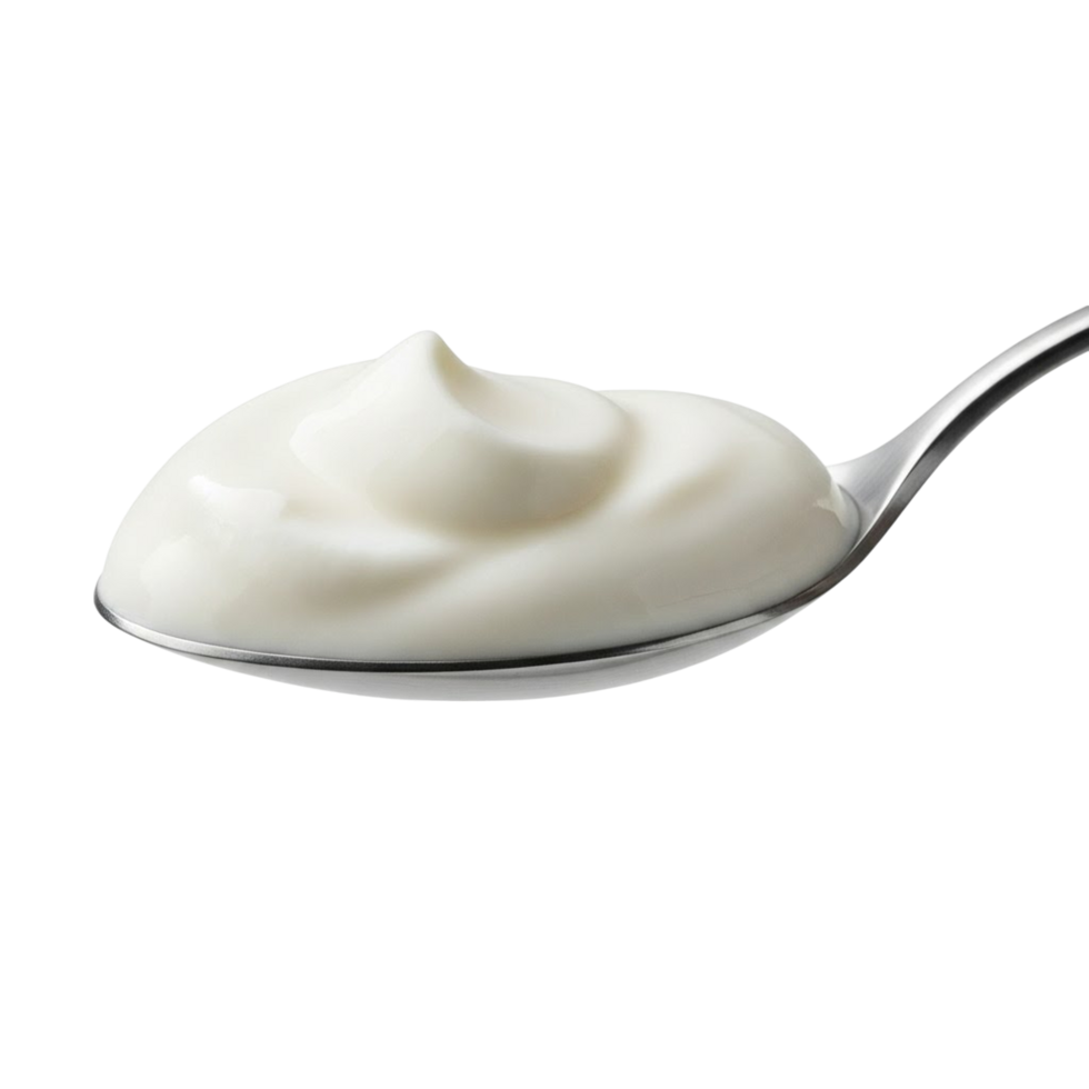 A close up of a metal spoon filled with creamy white yogurt against a transparent background png