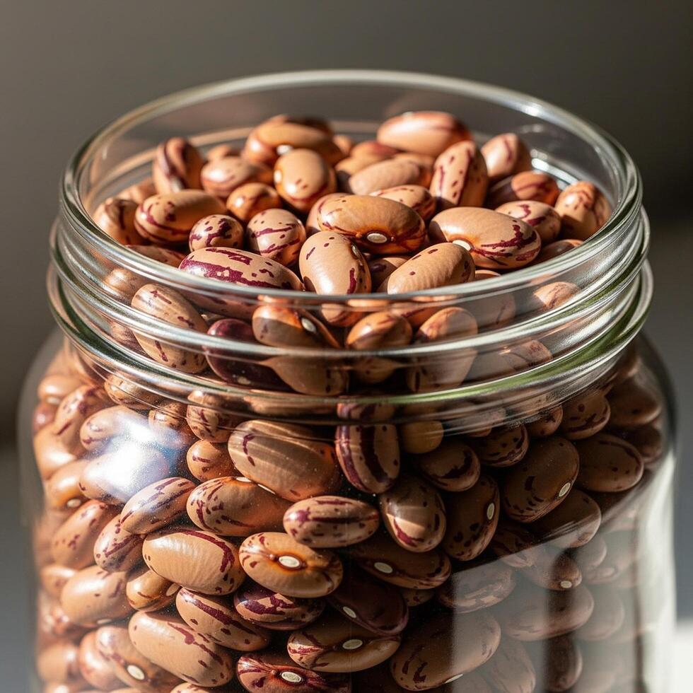 A jar filled with beans photo