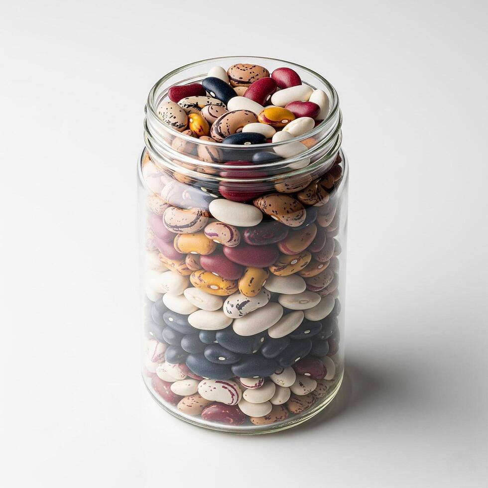 A jar filled with beans and other beans photo