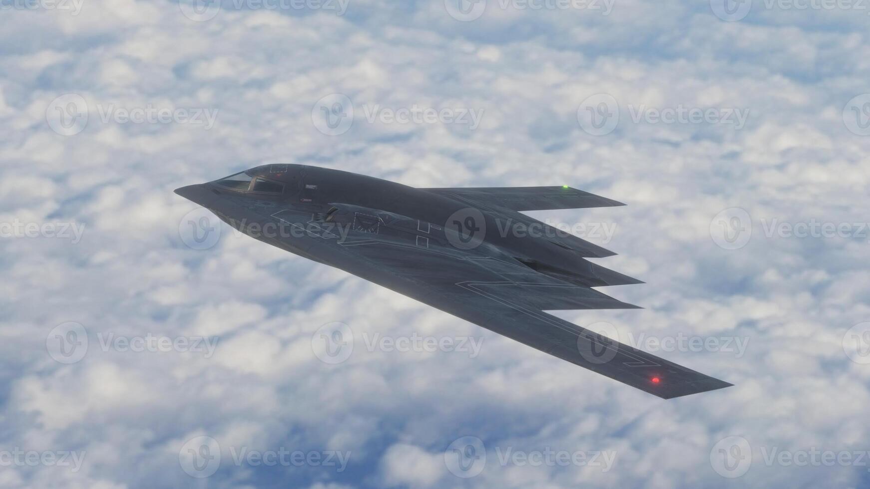 A stealth fighter jet flying through the sky photo