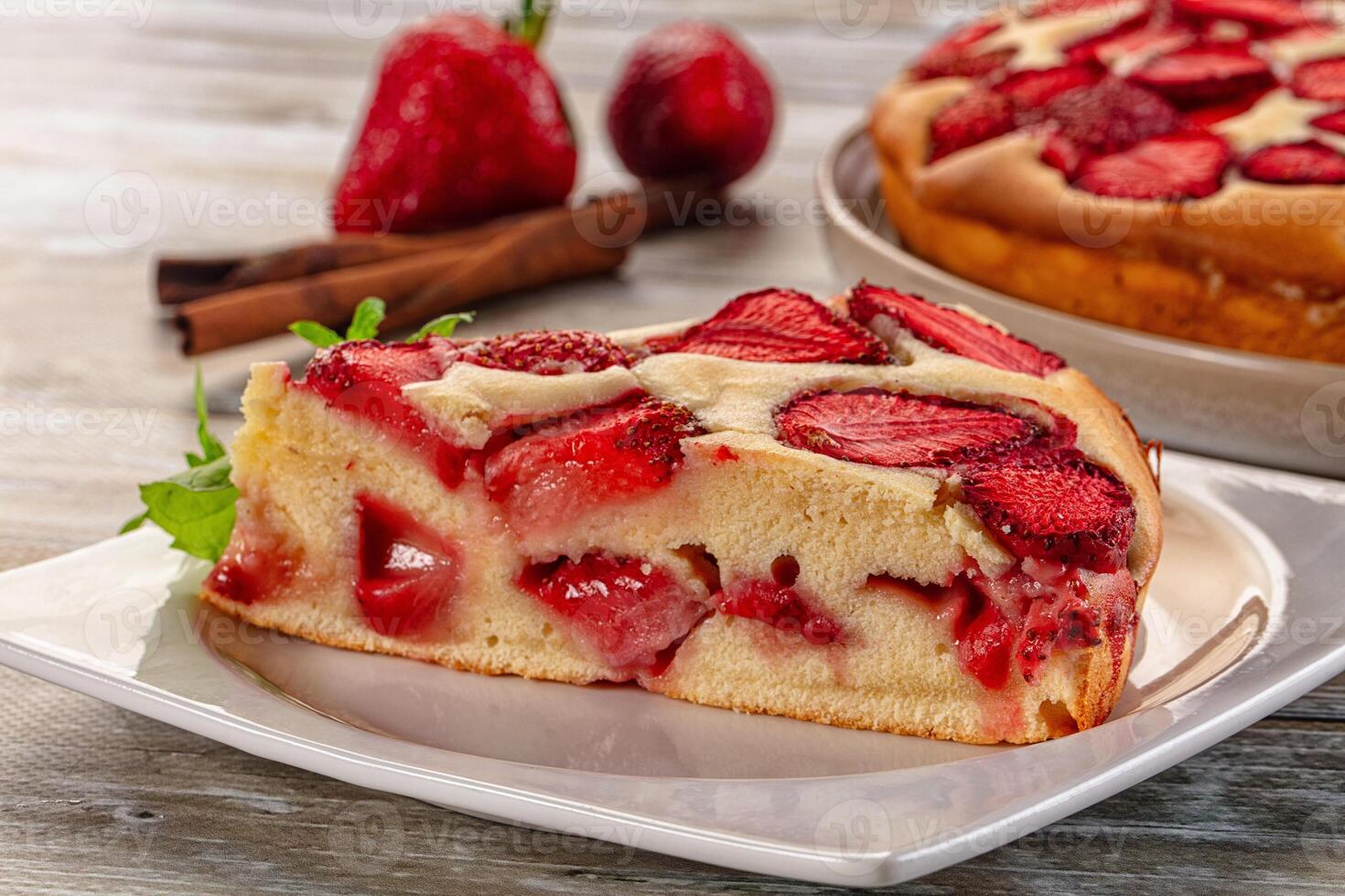 A slice of strawberry cake on a plate photo