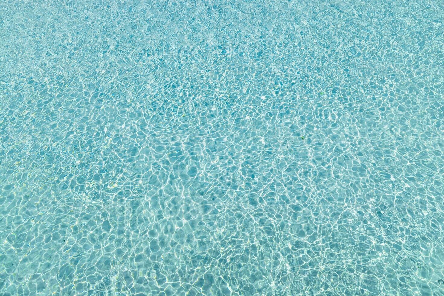Blue water pool texture pattern summer background ocean vibe tranquil surface sparkling clean sea ripples refreshing tropical scenery vacation mood relaxing environment calm aqua reflection light photo