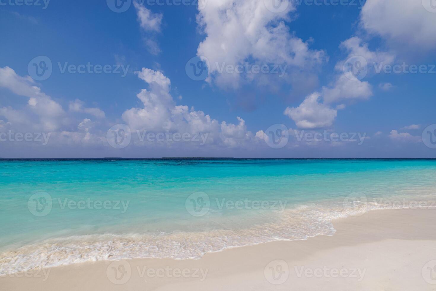 Scenic tropical beach shore closeup white sand clear turquoise sea bright sunny sky warm summer sunshine perfect natural background travel vacation seaside relaxation tropical getaway photo