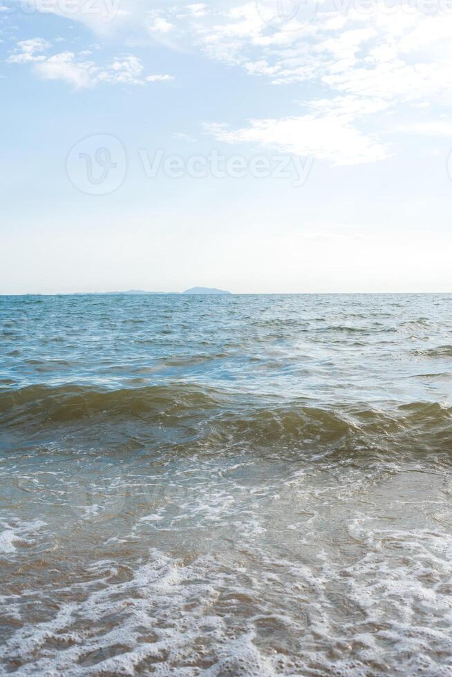 Atmosphere of the waves with a gentle breeze at Bangsaen, Chonburi, Thailand photo