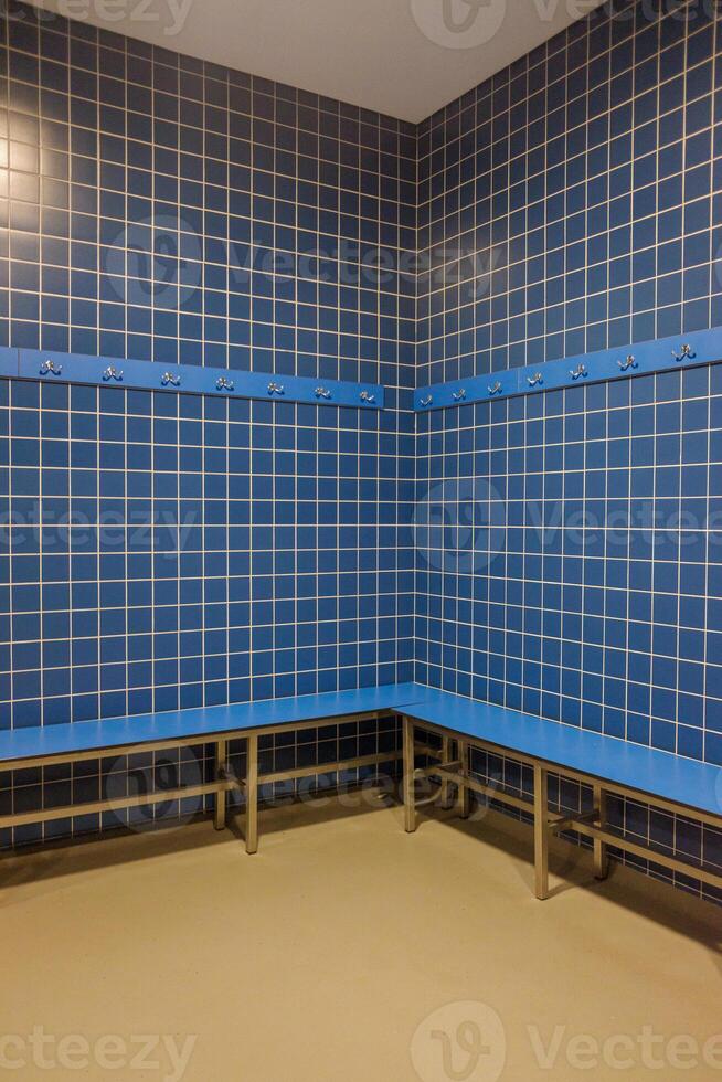 indoor swimming pool amenities changing area perspective geometric pattern of tiles in a vacant changing area photo