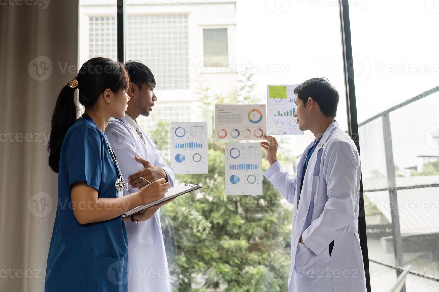 Doctor team engaging in collaborative meeting for health insights photo